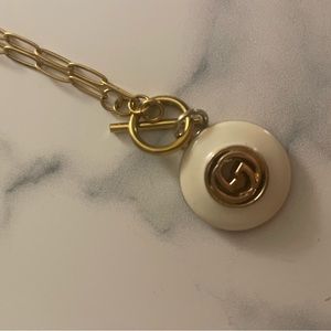 Up cycled white Gucci button necklace